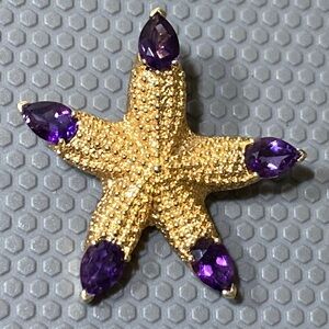 14k yellow gold rate starfish with amethyst gemstones